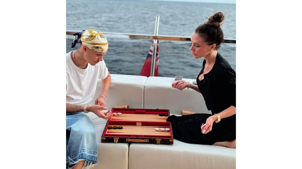 Romeo and Victoria were pictured with Louis Vuitton's sell-out 'Boîte Jeu Backgammon' board