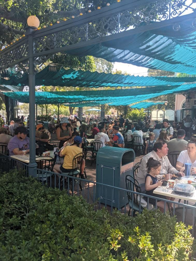 People dine at Disneyland on June 15, 2021.