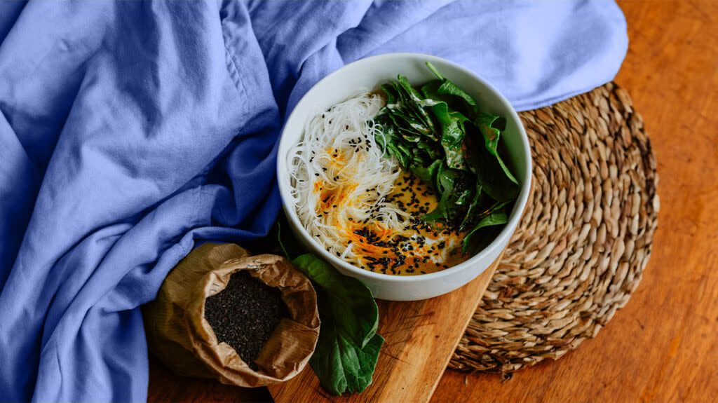 bowl of noodle soup and bag of chia seeds