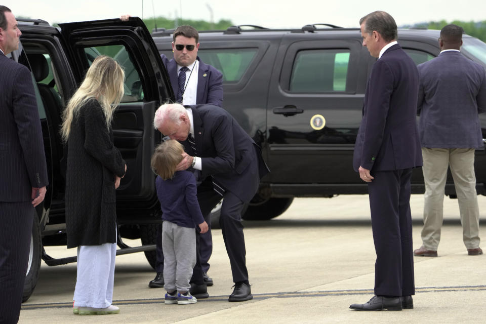 President Joe Biden greets his grandson Beau Biden as Hunter Biden and wife Melissa Cohen Biden watch, at Delaware Air National Guard Base in New Castle, Del., Tuesday, June 11, 2024. (AP Photo/Manuel Balce Ceneta)