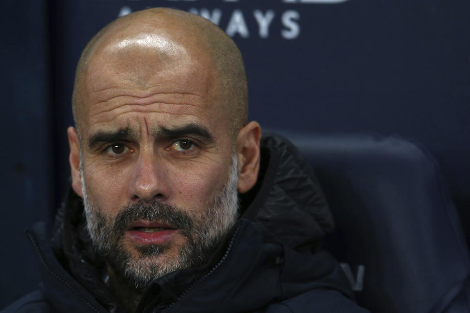 Manchester City's coach Pep Guardiola is from bench of his team during the English Premier League soccer match between Manchester City and Wolverhampton Wanderers at the Etihad Stadium in Manchester, England, Monday, Jan. 14, 2019. (AP Photo/Dave Thompson)