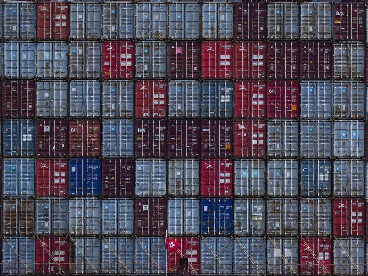 Cargo containers are seen on the Maersk Stockholm ship while docked at port in Vancouver on April 25.  (Darryl Dyck/The Canadian Press - image credit)