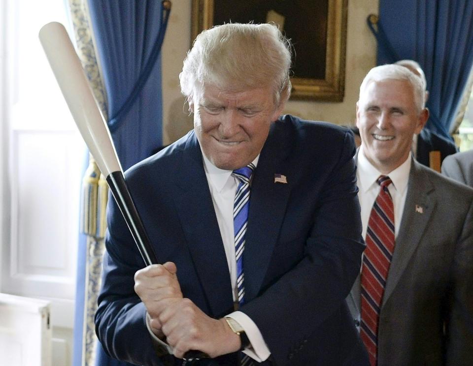 Trump grips&nbsp;a Marucci baseball bat.