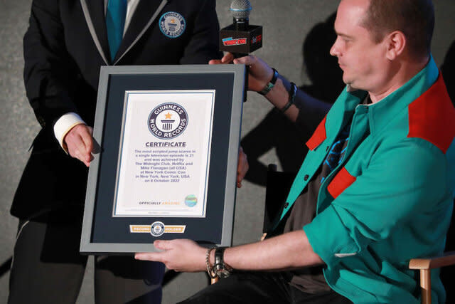 Andrew Glass of Guinness World Records awards Mike Flanagan