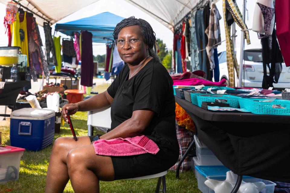 Latonia Jones poses for a portrait in Wilson, N.C., at the 301 Endless Yard Sale Friday, June 14, 2024.