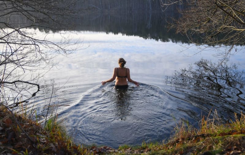 The anxiety, poor concentration, hot flushes and night sweats that often accompany menopause can sometimes be alleviated by swimming in cold water, new research suggests. Patrick Pleul/dpa