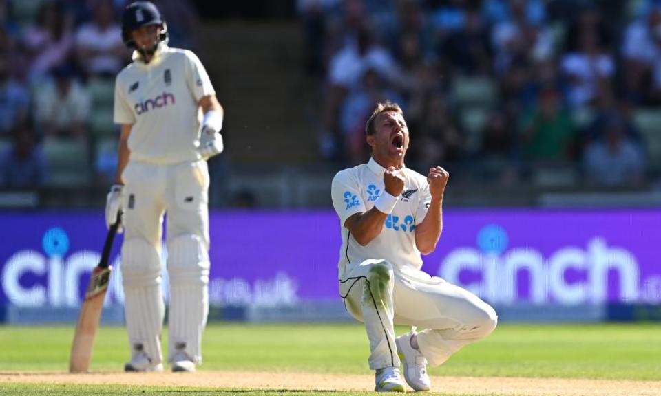 Neil Wagner picks up the wicket of Ollie Pope as England captain Joe Root looks on ruefully.