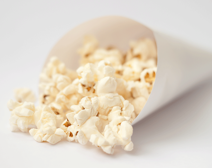 <p>Can't decide between the two tantalizing flavors but can't think of one food item that satisfies both cravings? Grab some popcorn (try these 10 <a rel="nofollow noopener" href="http://www.health.com/health/gallery/0,,20843728,00.html" target="_blank" data-ylk="slk:healthy flavored popcorn recipes;elm:context_link;itc:0;sec:content-canvas" class="link ">healthy flavored popcorn recipes</a>). "I love popcorn because it is a 100% whole grain which is also heart healthy, and there are so many great ways to add flavor to it," says Gans. Try adding some cinnamon and almond butter to air popped popcorn for the perfect balance of salty and sweet, as research shows the spice can reduce blood glucose levels, which can also help ward off cravings, and almond butter brings healthy fat that makes it taste extra decadent. </p>