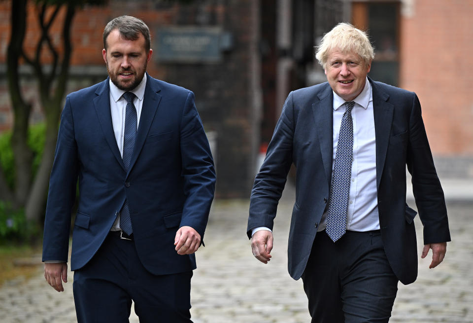 File photo dated 12/05/22/ of Prime Minister Boris Johnson (right) arriving with Conservative MP for Stoke on Trent North, Jonathan Gullis for a regional cabinet meeting at Middleport Pottery in Stoke on Trent. Mr Gullis has resigned his role as parliamentary private secretary to the Secretary of State for Northern Ireland, saying the Conservative Party has been 