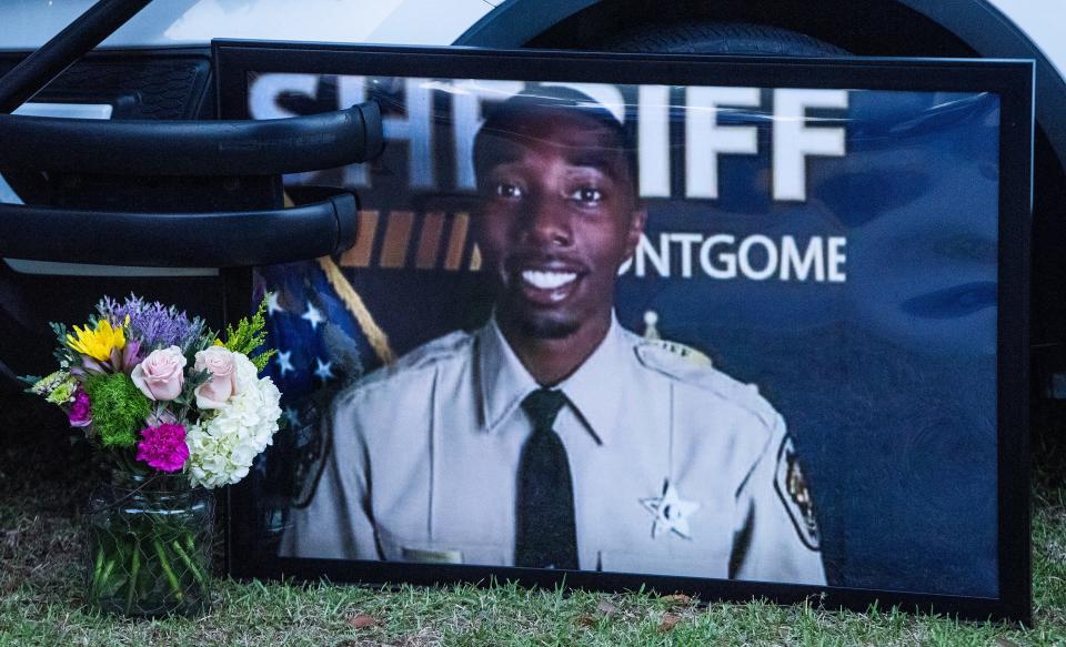 A photo of fallen Deputy Jarmyious Young is displayed as the Montgomery County Sheriff's Office holds a celebration of life, Thursday April 11, 2024 at the Sheriff’s office in Montgomery, Ala., honoring Deputy Young, who died from injuries he sustained in a crash while responding to a call.