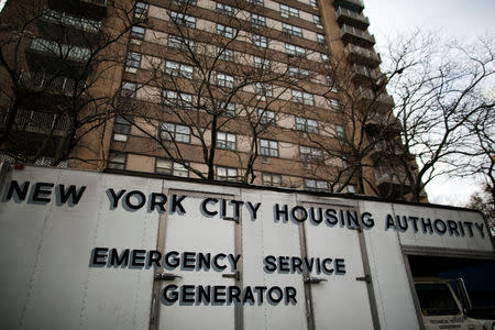 FILE PHOTO: A generator provides electricity to NYCHA buildings that have no water or heat, following Hurricane Sandy in the Brooklyn borough neighborhood of Coney Island in New York, U.S., November 13, 2012. REUTERS/Lucas Jackson/File Photo