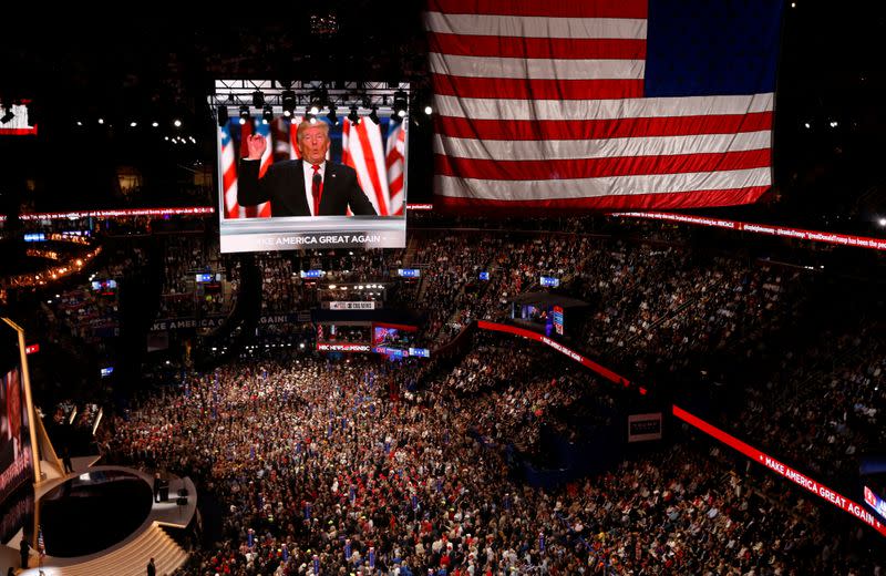 FILE PHOTO: Republican presidential nominee Donald Trump is seen speaking on video monitors during the Republican National Convention in Cleveland, Ohio