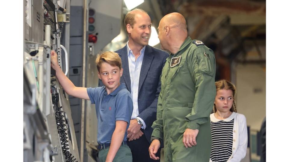 Prince George operating a machine at air show