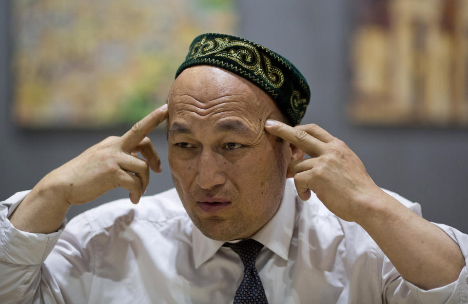 FILE - In this March 29, 2018, file photo, Omir Bekali talks about the psychological stress he endures in a Chinese internment camp during an interview in Almaty, Kazakhstan. Bekali, a former detainee in China's internment camps for Muslims, says his application for a visa to visit the United States was rejected despite an invitation to speak at Congress about his ordeal. (AP Photo/Ng Han Guan, File)