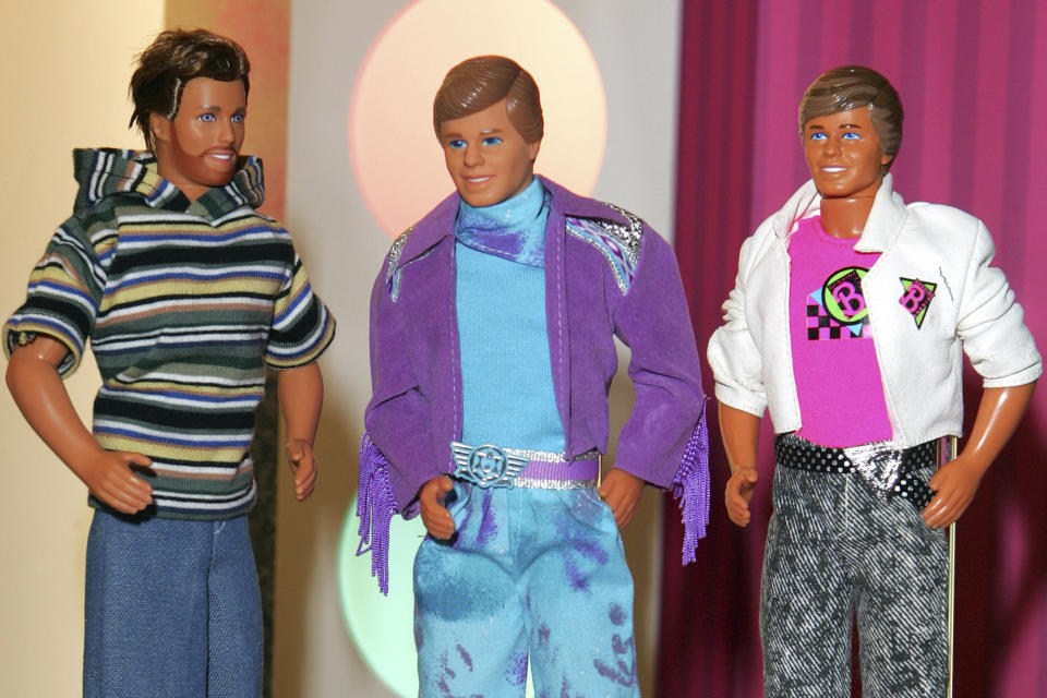 File - Older versions of Ken dolls are displayed at Mattel's showroom on Feb. 9, 2006, at the Toy Fair in New York. As reflected in Greta Gerwig's blockbuster movie "Barbie", that tackles the legacy Mattel's famous doll, Barbie has always been more popular than Ken. (AP Photo/Dima Gavrysh, File)