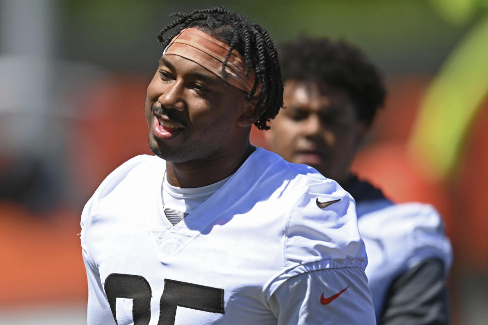 Cleveland Browns defensive linemen Myles Garrett smiles during an NFL football practice at the team's training facility, Thursday, June 17, 2021, in Berea, Ohio. (AP Photo/David Dermer)