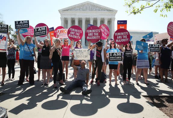 Protesters on both sides of the abortion issue rally in front of the U.S. Supreme Court building  in Washington, D.C, on June 20, 2016.
