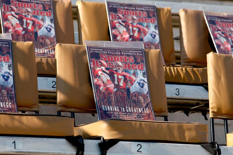 PHOTO: In this Nov. 23, 2012, file photo, copies of Sports Illustrated's Heisman Running to Greatness issue are shown in the stands at Doak Campbell Stadium in Tallahassee, Fla. (Don Juan Moore/AP, FILE)