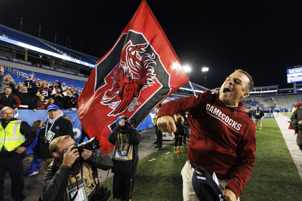 South Carolina coach Shane Beamer celebrates the team's win over Kentucky in an NCAA college football game in Lexington, Ky., Saturday, Oct. 8, 2022. (AP Photo/Michael Clubb)