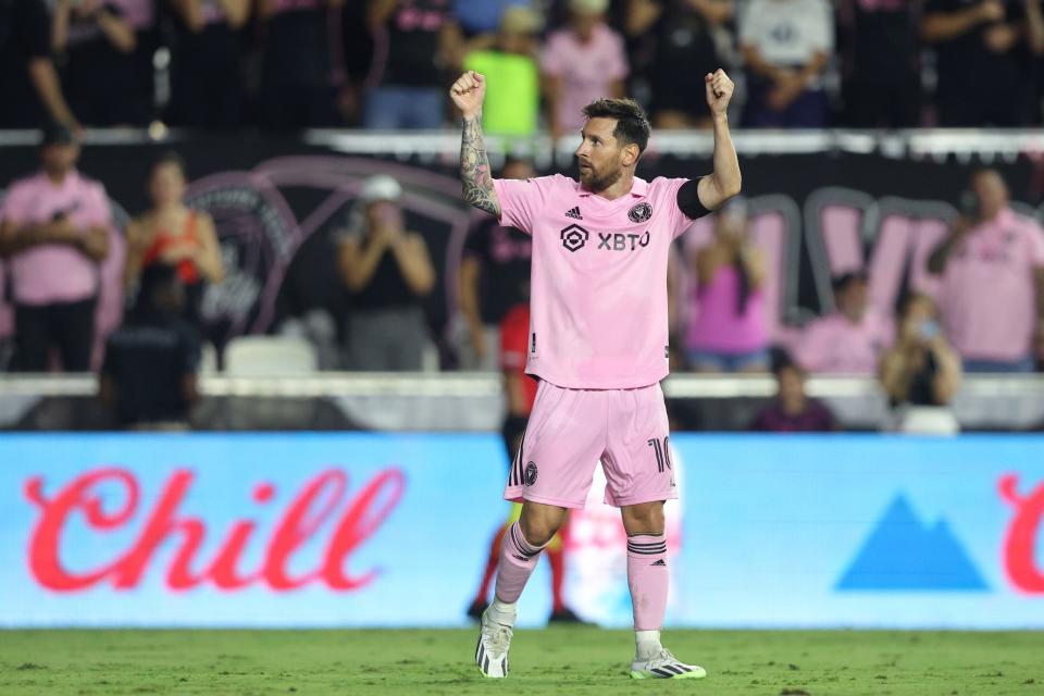 Inter Miami CF forward Lionel Messi celebrates after scoring a goal against Orlando City SC during the second half at DRV PNK Stadium on August 3.