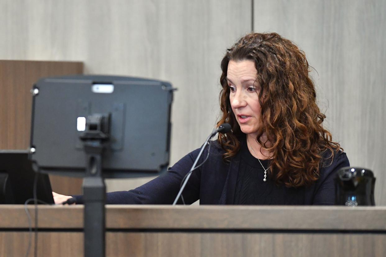 Dr. Michelle Smith, a critical care physician with Johns Hopkins All Children's Hospital, testifies Thursday, Oct. 19, 2023 at the South County Courthouse in Venice, Florida, about the three days in October 2016 that she cared for Maya Kowalski in the pediatric intensive care unit. The Kowalski family is suing Johns Hopkins All Children's Hospital for false imprisonment, negligent infliction of emotional distress, medical negligence, battery, and other claims more than a year after the family matriarch, Beata Kowalski, took her life following allegations she was abusing her daughter, Maya Kowalski. Pool photo/Mike Lang/Sarasota Herald-Tribune