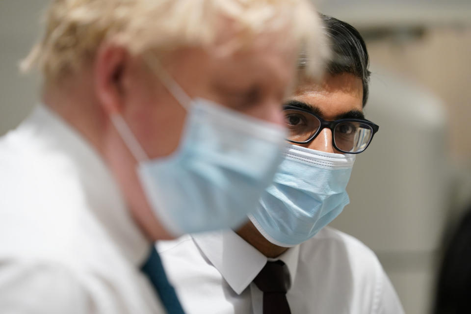 MAIDSTONE, ENGLAND - FEBRUARY 07: British Prime Minister Boris Johnson and Chancellor Rishi Sunak during a visit to the Kent Oncology Centre at Maidstone Hospital in Kent on February 7, 2022 in Maidstone, United Kingdom. (Photo by Gareth Fuller - WPA Pool/Getty Images)