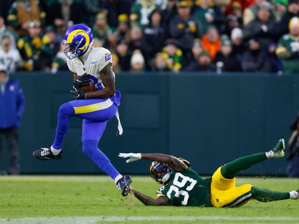 Van Jefferson jumps away from a defender against the Green Bay Packers.