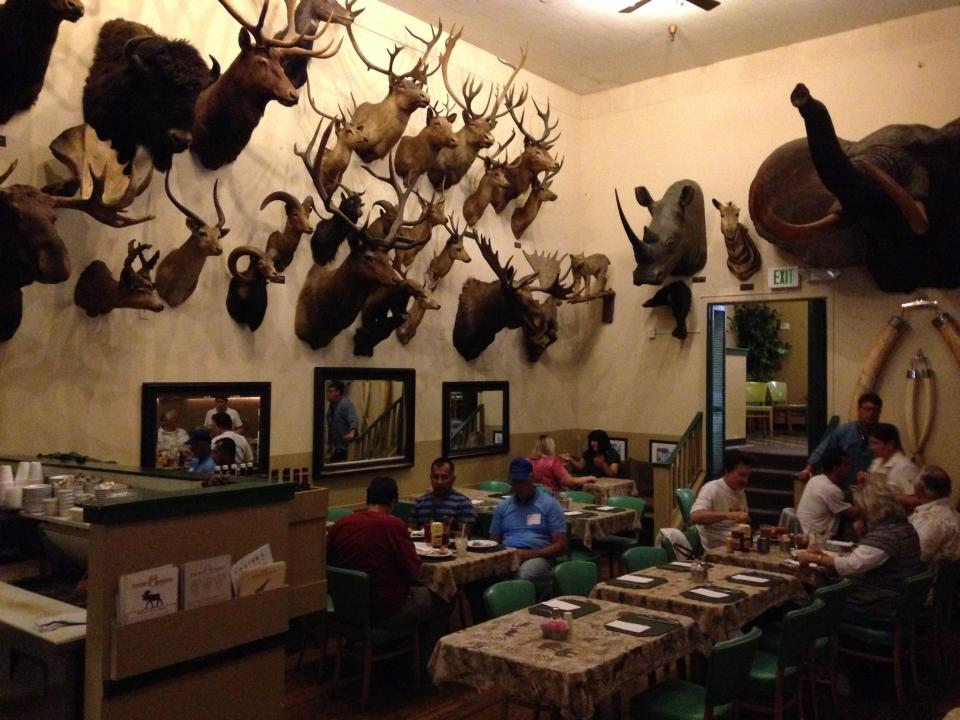 Foster’s Big Horn Restaurant’s dining room features some 250 big game heads from its owner’s hunting trips in the 1930s.