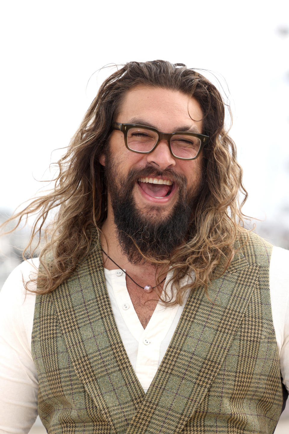 Jason Momoa laughs