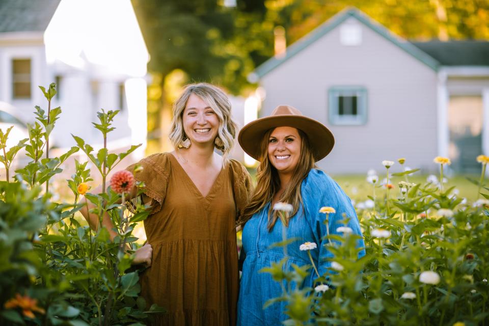 Sparrow Bloom owners (l. to r.) Kait Bibb and Becca Barnell welcomed customers into their store's permanent home in Lansing's Stadium District earlier this month,