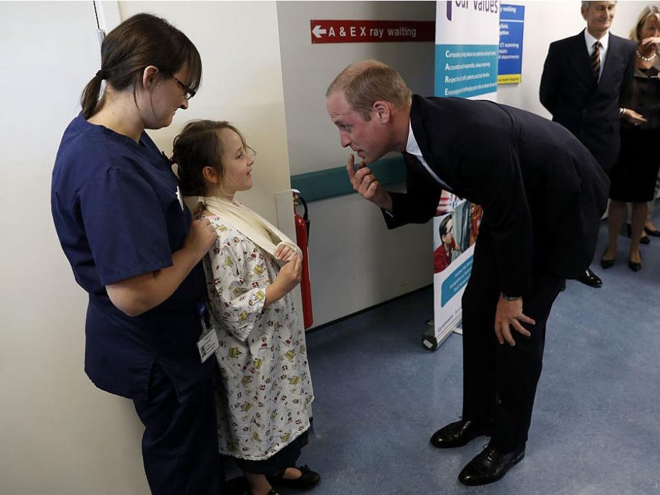Prince William visits hospital patients