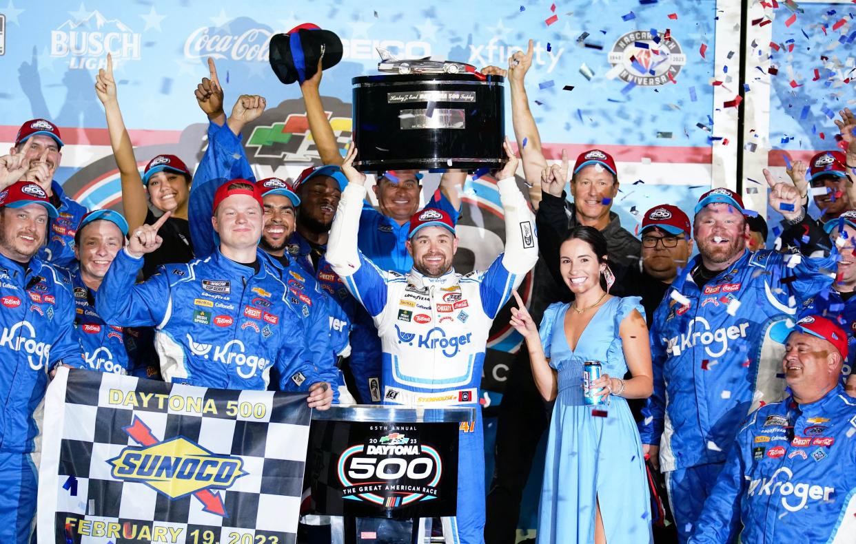 Feb. 19: Ricky Stenhouse Jr., center, celebrates after winning the Daytona 500 at Daytona International Speedway.