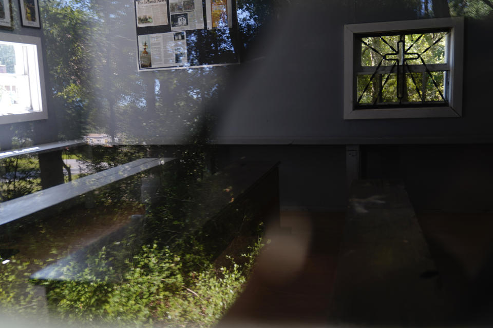 The inside of the the Coffin Point Community Praise House is seen on Tuesday, Sept, 19, 2023, in St. Helena Island, S.C. Historic Black communities have dwindled from their once-thriving existence in the United States and efforts to preserve what's left encounter complicated challenges. The incorporated towns were founded by formerly enslaved people and often had their own churches, schools, stores and economic systems. (AP Photo/Brynn Anderson)