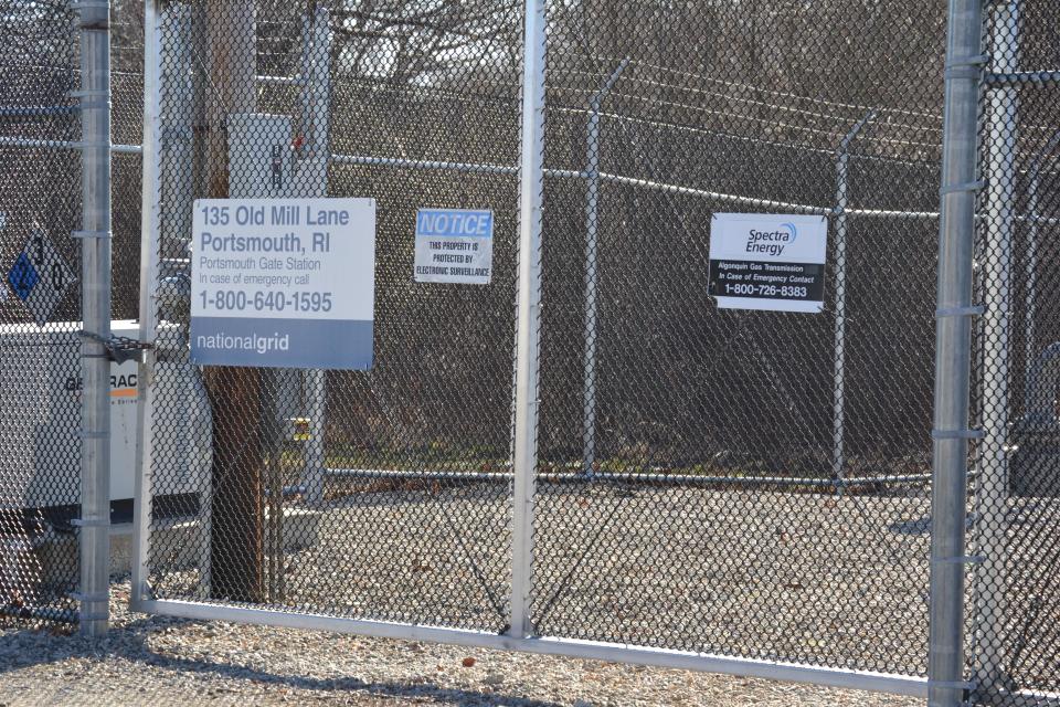 Signs outside the Portsmouth Gate Station inform residents of a number to call in case of an emergency at the site. National Grid, now Rhode Island Energy, established a temporary LNG facility next to the gate station on Old Mill Lane in Portsmouth to improve gas reliability on Aquidneck Island.