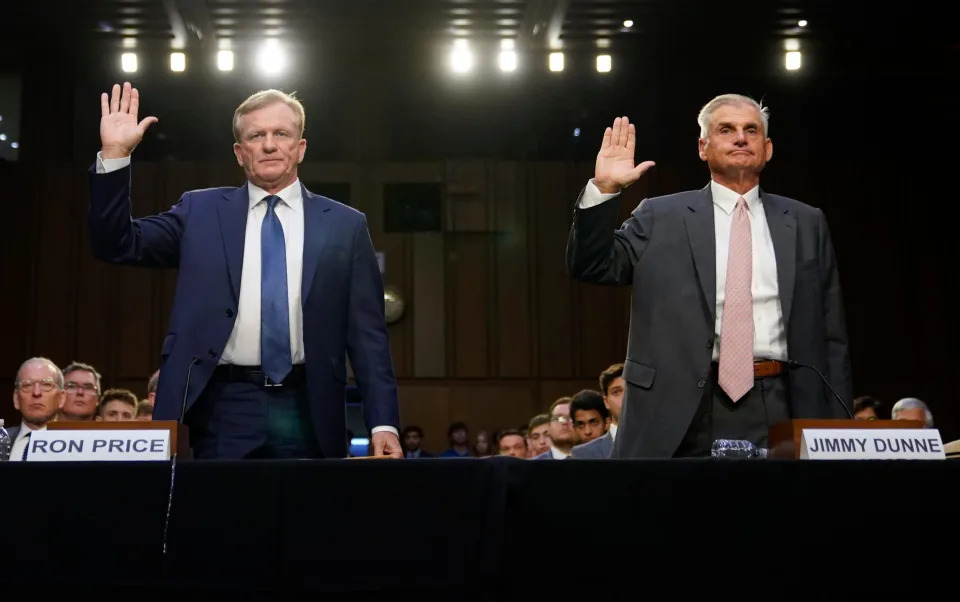 PGA Tour chief operating officer Ron Price, left, and PGA Tour board member Jimmy Dunne are sworn in