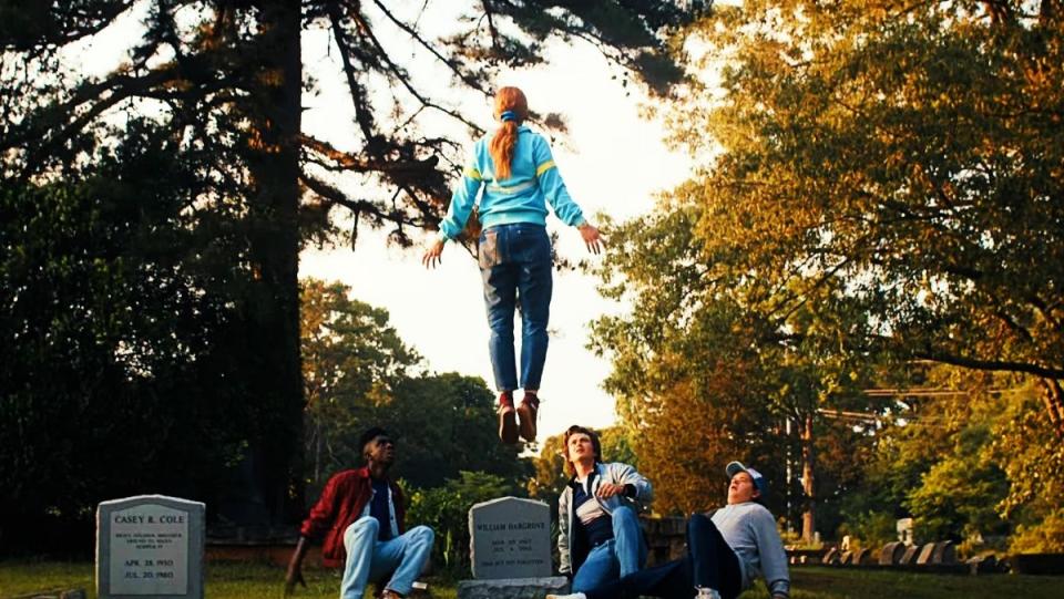 Max floating above her brother's grave in Stranger Things 4.