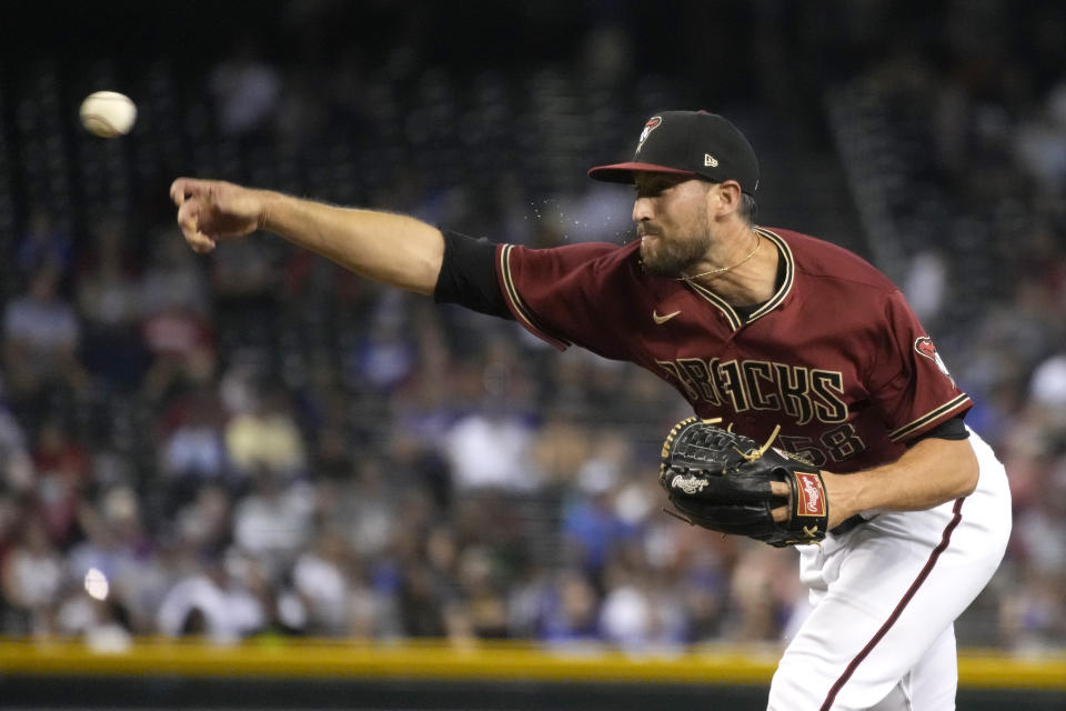 Arizona Diamondbacks relief pitcher Stefan Crichton throws against the Los Angeles Dodgers in the fifth inning during a baseball game, Sunday, Aug 1, 2021, in Phoenix. (AP Photo/Rick Scuteri)