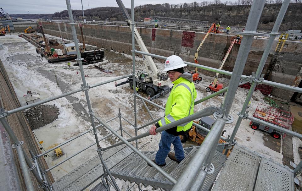 Lockmaster Steve Heidbrider walks down to the bottom at Lock and Dam No. 2 on Jan. 30 on the Mississippi River in Hastings, Minnesota.