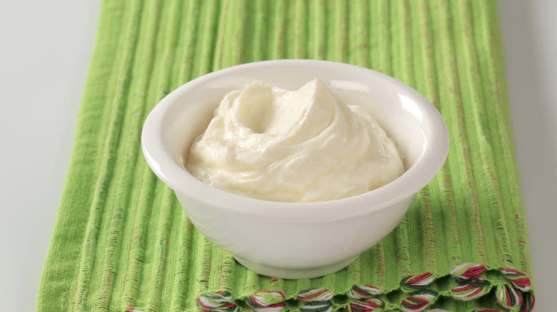 Cream cheese in white bowl