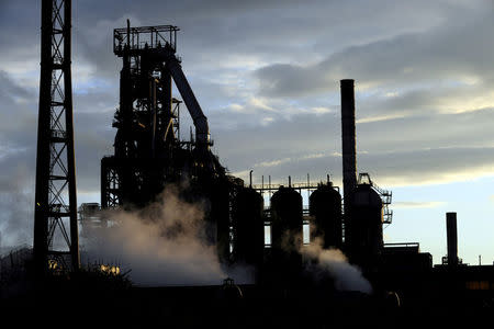 One of the blast furnaces of the Tata Steel plant is seen at sunset in Port Talbot, South Wales, May 31, 2013. REUTERS/Rebecca Naden/File Photo