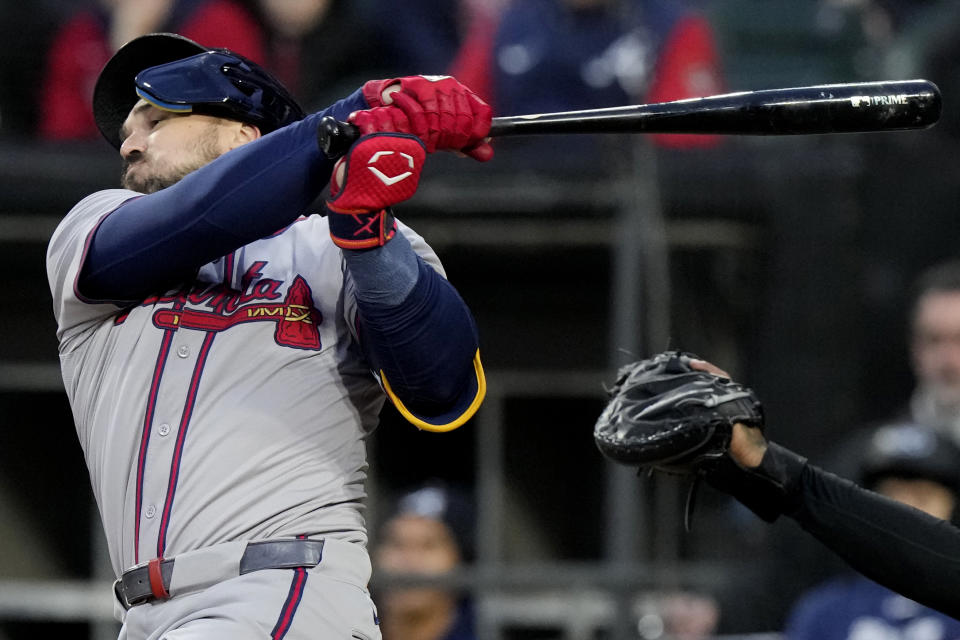 Atlanta Braves' Adam Duvall strikes out swinging during the second inning of a baseball game against the Chicago White Sox in Chicago, Tuesday, April 2, 2024. (AP Photo/Nam Y. Huh)