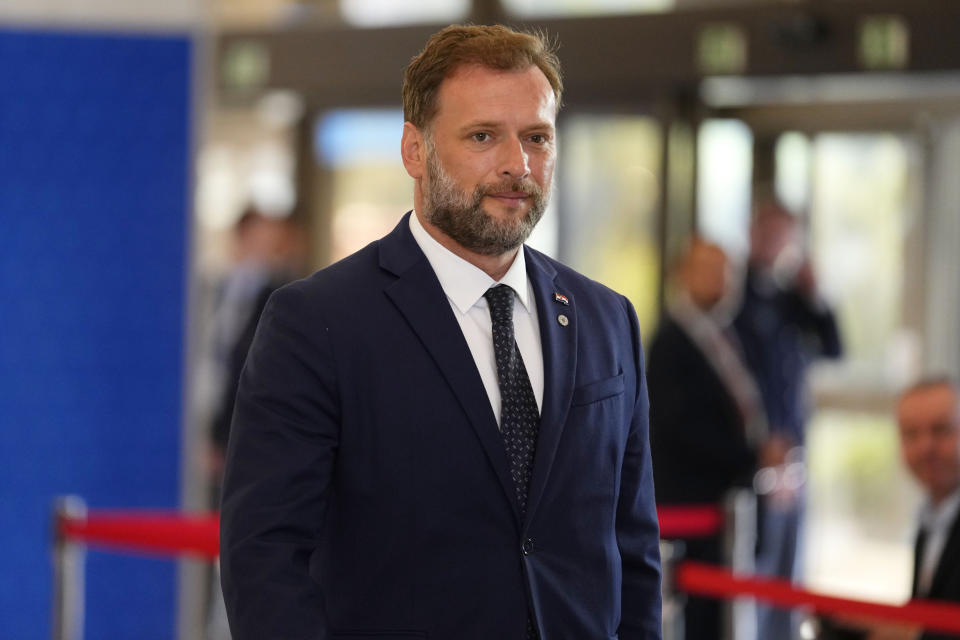 Croatia's Defense Minister Mario Banozic arrives for a meeting of EU Defense Ministers at the Prague Congress Center in Prague, Czech Republic, Tuesday, Aug. 30, 2022. (AP Photo/Petr David Josek)