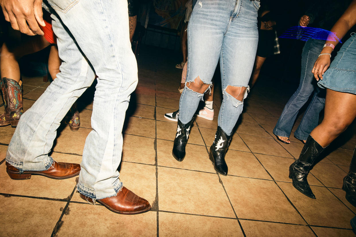 Fans dance to Beyonce in cowboy boots (JerSean Golatt for NBC News)