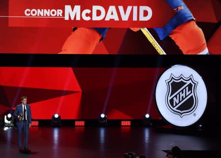 Jun 21, 2017; Las Vegas, NV, USA; Edmonton Oilers player Connor McDavid wins the Hart Trophy as the league MVP during the 2017 NHL Awards and Expansion Draft at T-Mobile Arena. Mandatory Credit: Stephen R. Sylvanie-USA TODAY Sports