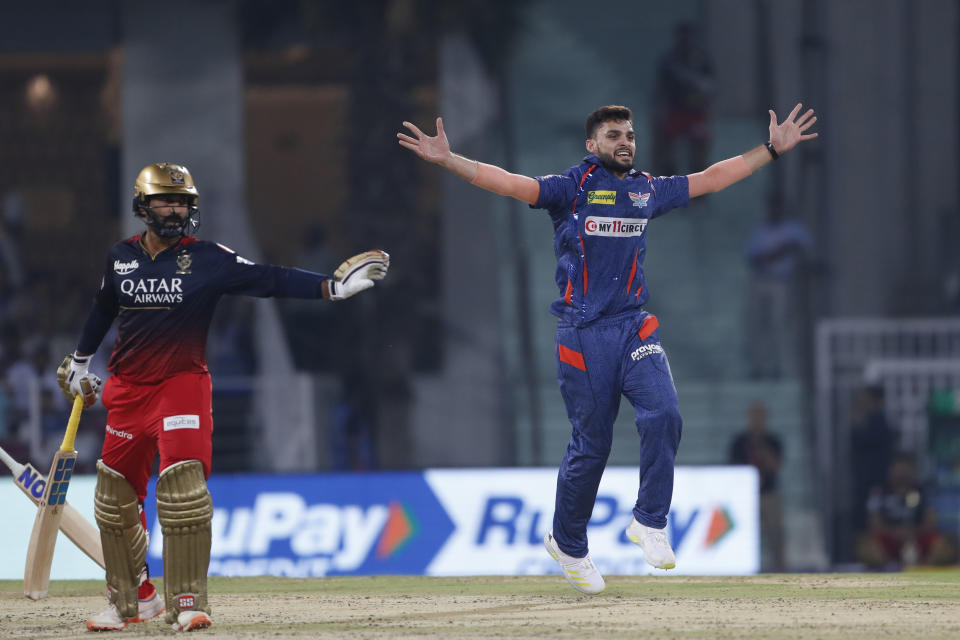 Lucknow Super Giants' Naveen Ul Haq successfully apeals for the wicket of Royal Challengers Bangalore's Mahipal Lomror during the Indian Premier League (IPL) match between Lucknow Super Giants and Royal Challengers Bangalore in Lucknow, India, Monday, May 1, 2023. (AP Photo/Surjeet Yadav)