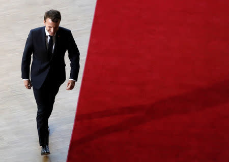 FILE PHOTO: French President Emmanuel Macron arrives at an extraordinary European Union leaders summit to discuss Brexit, in Brussels, Belgium April 10, 2019. REUTERS/Susana Vera