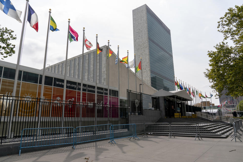 Metal barricades line the the shuttered main entrance to the United Nations headquarters, Friday, Sept. 18, 2020, in New York. With the COVID-19 pandemic still circling the globe, world leaders are skipping their annual gathering in New York and will make pre-recorded speeches this week on the state of a deeply divided world turned topsy-turvy. (AP Photo/Mary Altaffer)