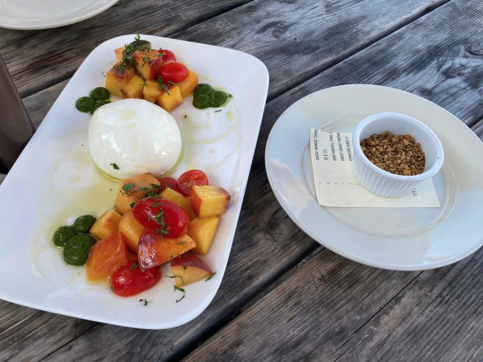 Burrata with the breadcrumbs on the side.