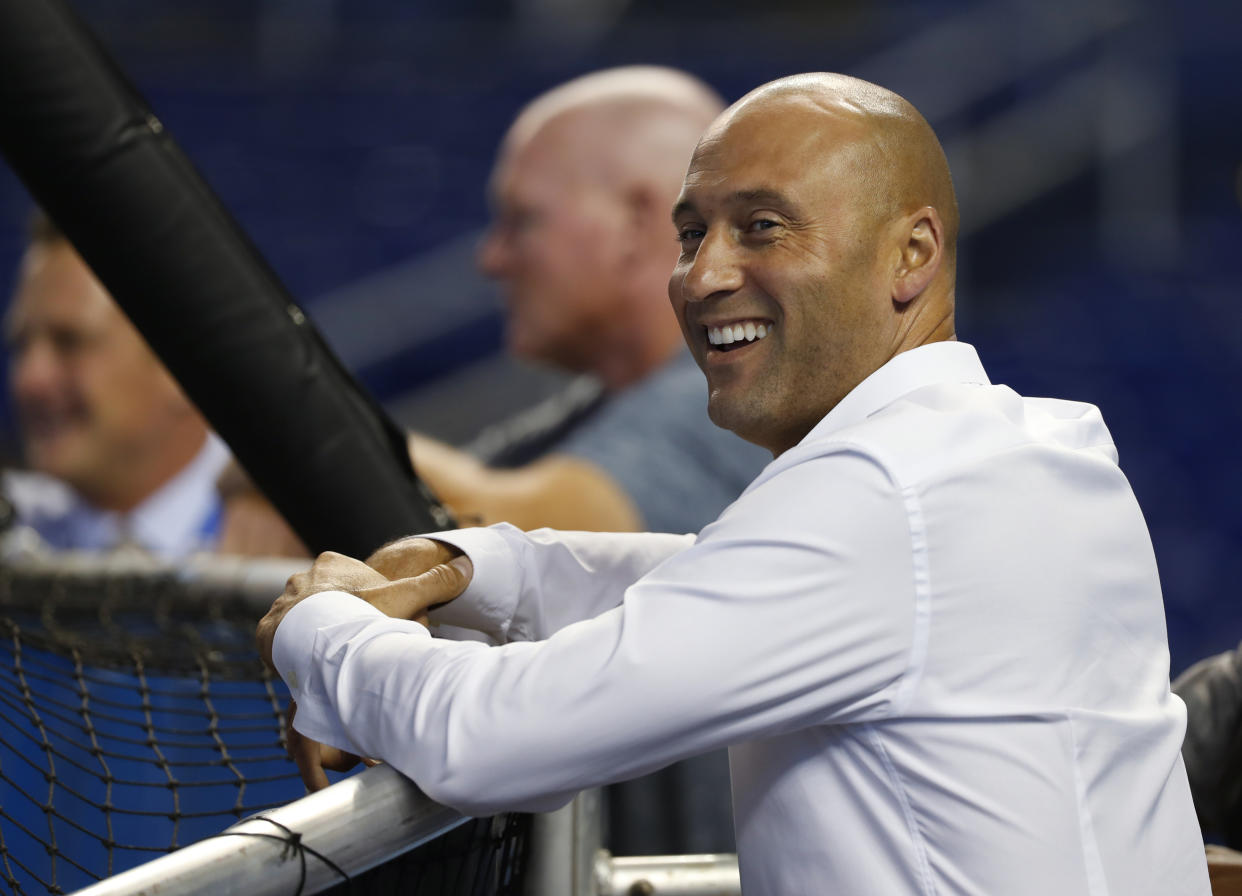 Baseball Hall of Famers Andre Dawson and Tony Perez say they're considering boycotting Derek Jeter's induction over Marlins firing. (AP Photo/Wilfredo Lee)