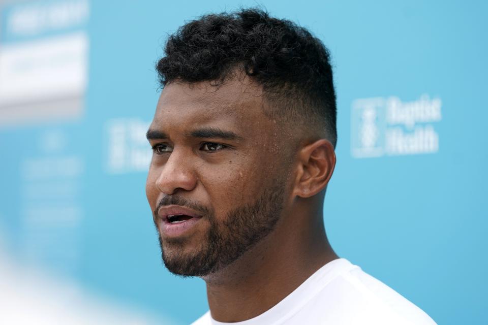 Miami Dolphins quarterback Tua Tagovailoa speaks to the news media at the NFL football team's practice facility, Thursday, June 2, 2022, in Miami Gardens, Fla. (AP Photo/Lynne Sladky)